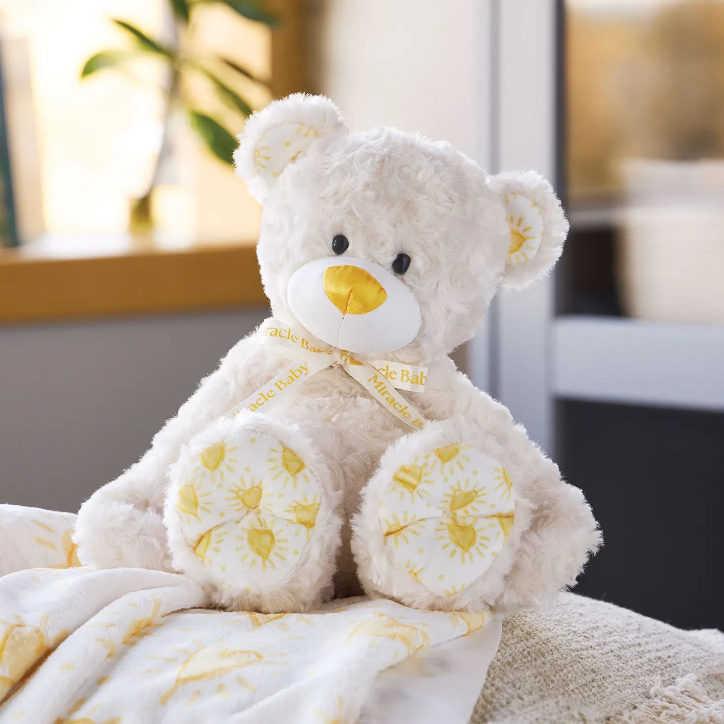 Demdaco Miracle Baby Bear Plush, 13"