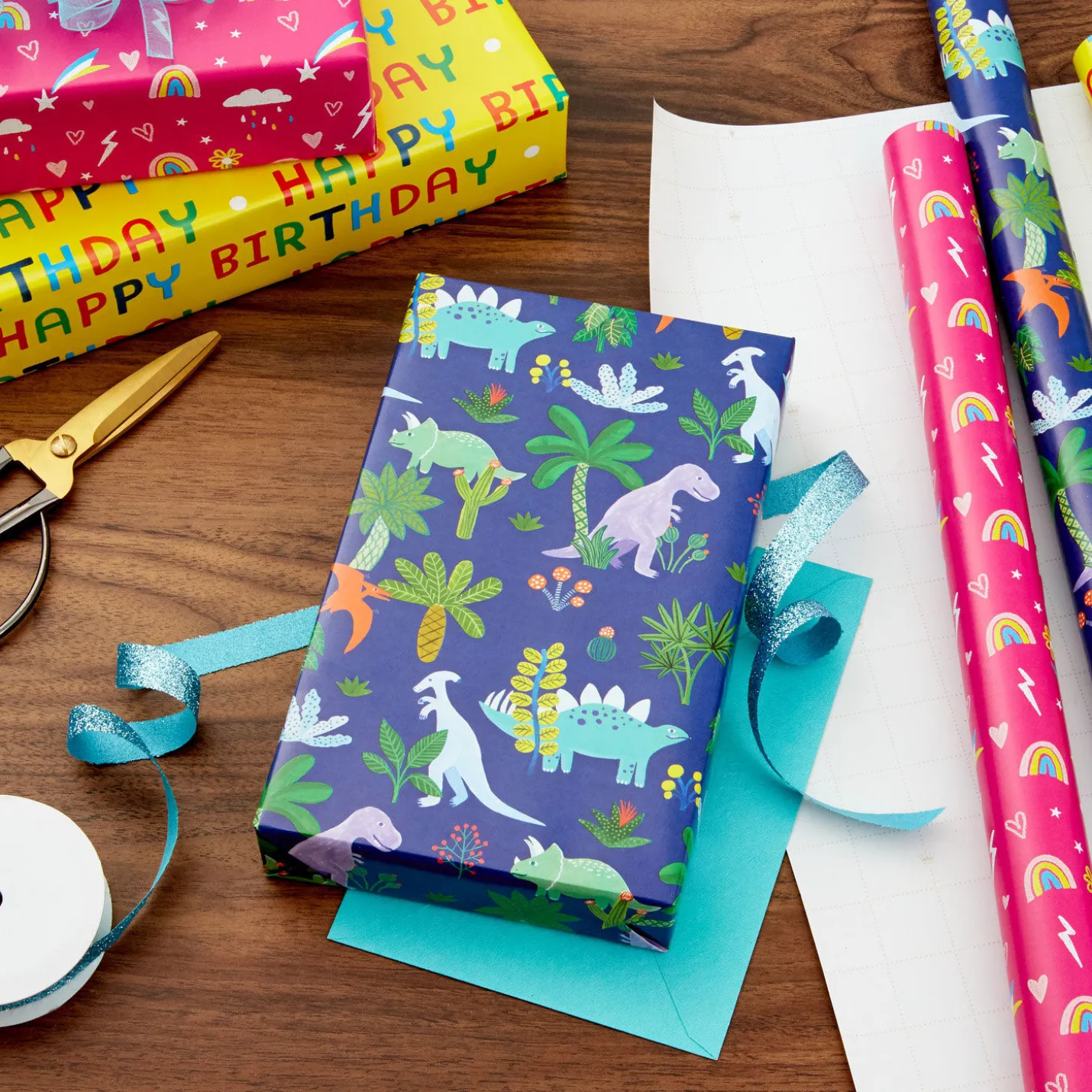Rainbows, Dinos and Happy Wishes 3-Pack Wrapping Paper Roll Bundle, 75 sq. ft. total